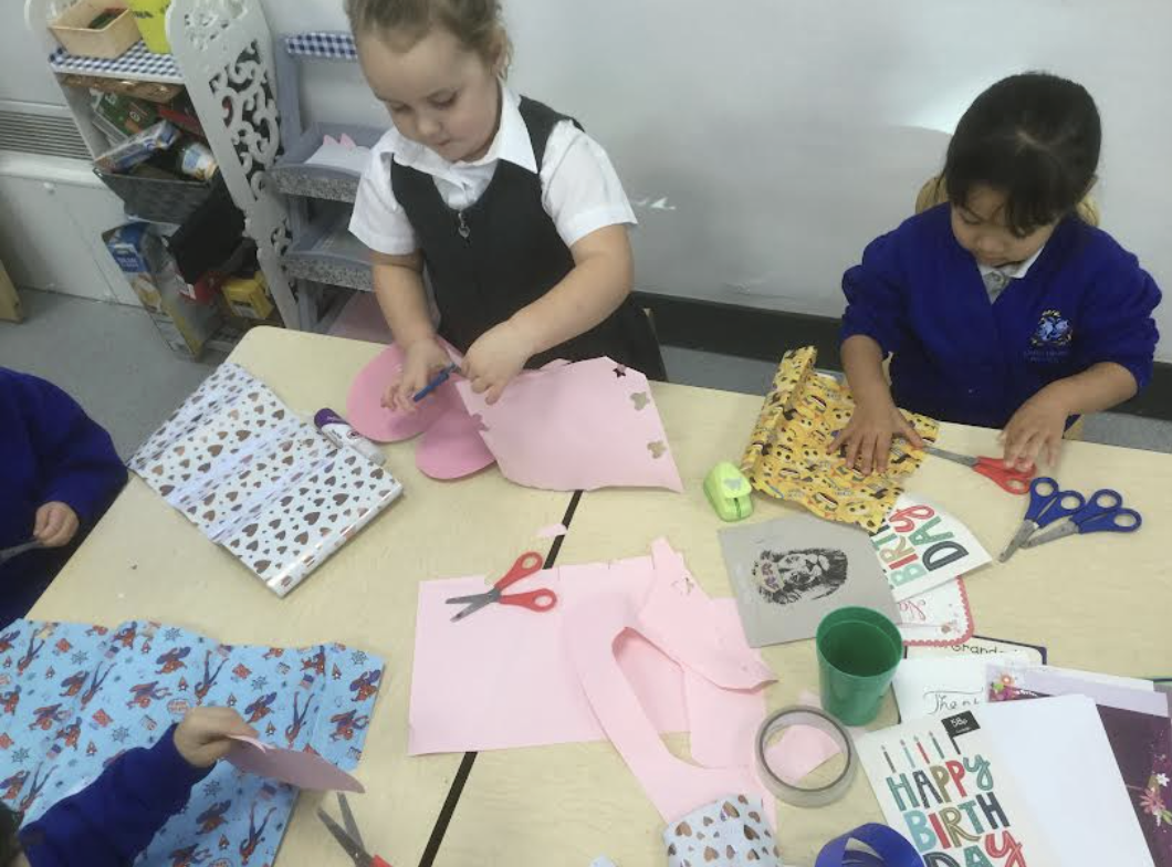 Students seen participating in crafts activities.